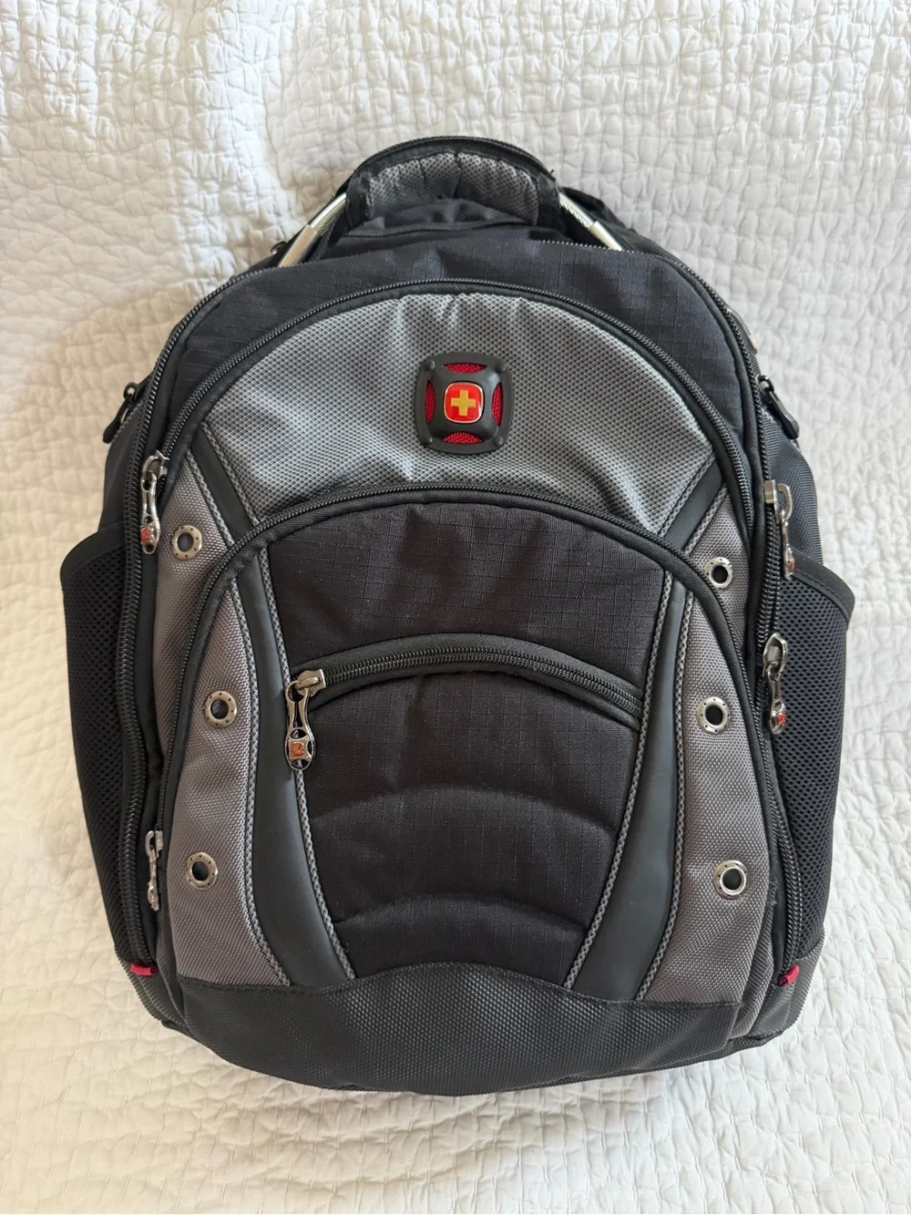 SwissGear Black and Gray Backpack with Red Logo Accent